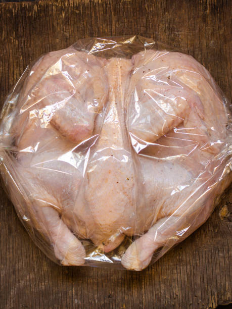 istock raw chicken - whole roasted chicken (chicken meat). Top view with copy space 1068824728