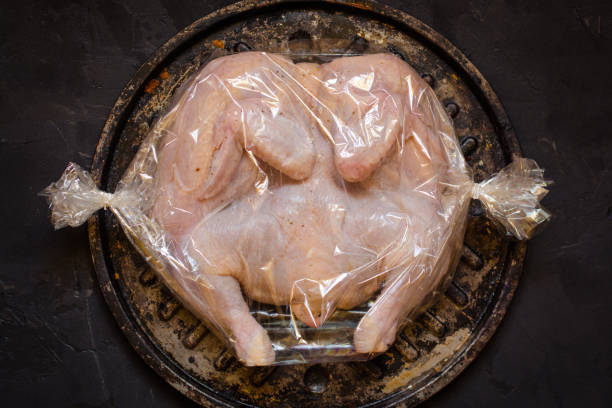 istock raw chicken - whole roasted chicken (chicken meat). Top view with copy space 1068824924