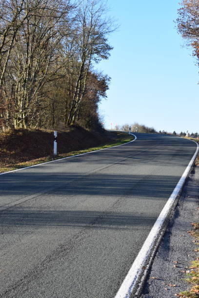 istock late autumn forest road, Eifel 2018 1068825140