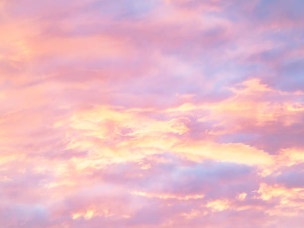 istock Colorful, pastel clouds at sunset 1068825312