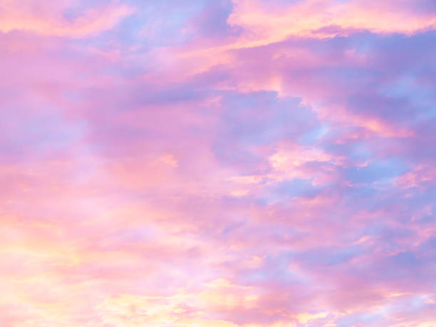 istock Colorful, pastel clouds at sunset 1068825328
