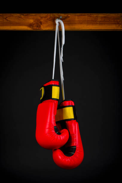 istock red boxing gloves on black background 1068825644