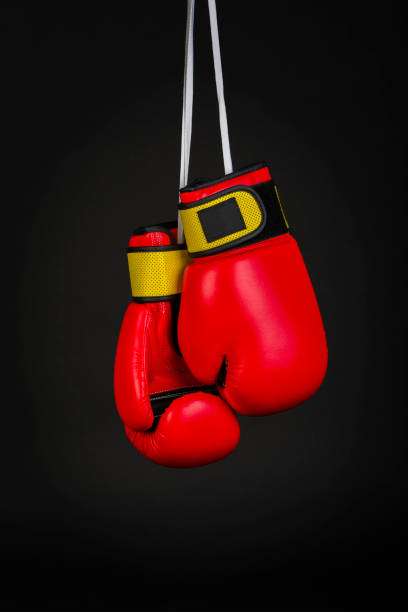 istock red boxing gloves on black background 1068825684