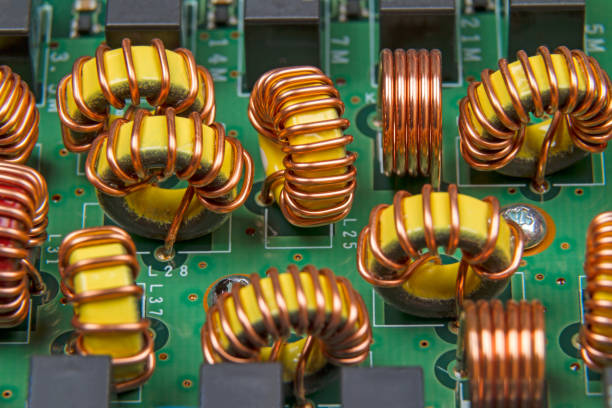 istock Electronic device with inductances on the rings. 1068827840