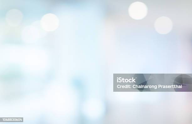 Abstract Blurred Beautiful Interior Of Lobby Reception Condominium Background With Bokeh Light From Lamp For Presentation Banner Design Stock Photo - Download Image Now