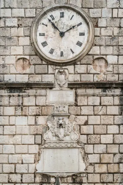 Photo of Clock on the Tower on the Square of Arms in Kotor