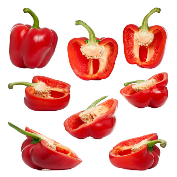 istock Sliced red peppers against white background 1068834268