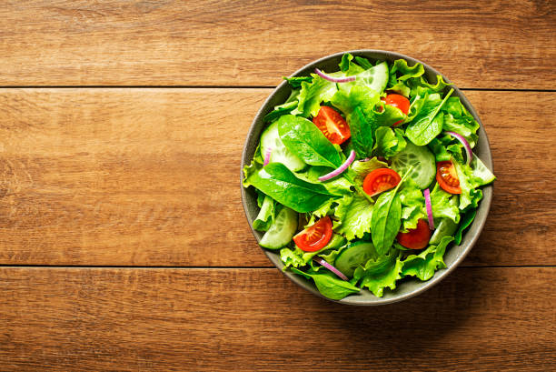 istock Healthy green salad with vegetables 1068834270