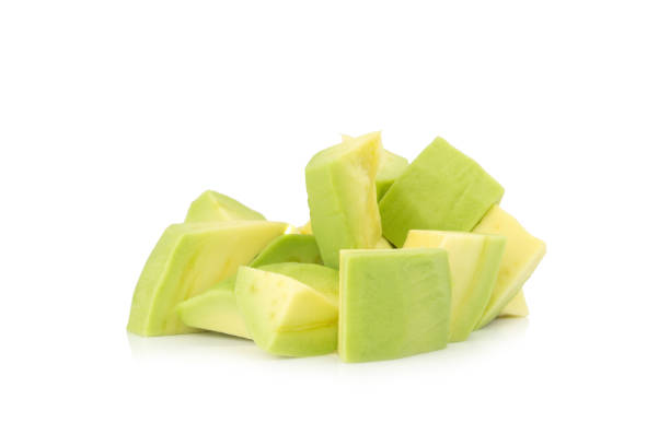 istock Avocado piece isolated on white background 1068836284