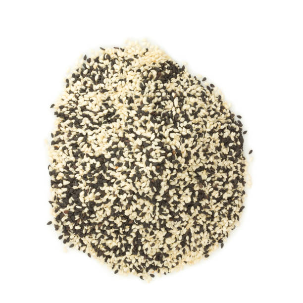 istock White sesame,black sesame isolated on white background 1068841150
