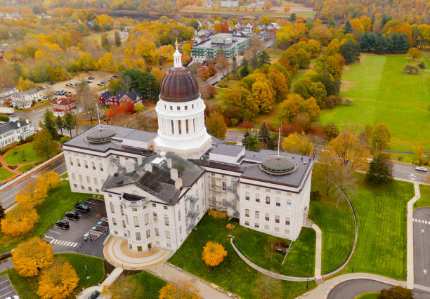 Capitol Building State House Augusta Maine Autumn Season Aerial Close to the peak of fall color in the leaves at the State House of Main in Augusta USA maine stock pictures, royalty-free photos & images