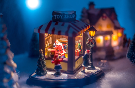 Christmas decoration toy city. Close-up with Christmas illumination