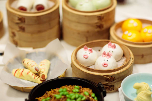istock Dim sum in bamboo steamer, animal theme for kids 1068856860