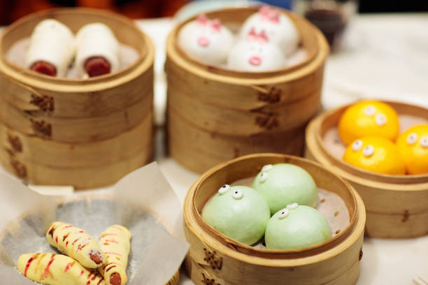 istock Dim sum in bamboo steamer, animal theme for kids 1068858126