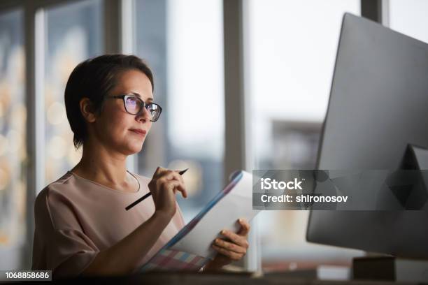 Employee In Office Stock Photo - Download Image Now - Financial Advisor, Office, Document