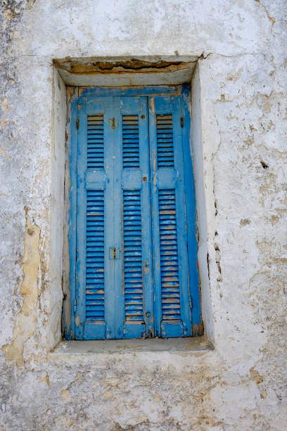 istock Greek Island wooden shutter 1068871678