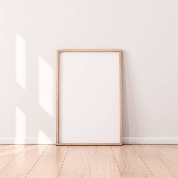 istock Poster with Wooden Frame Mockup standing on the floor 1068872234