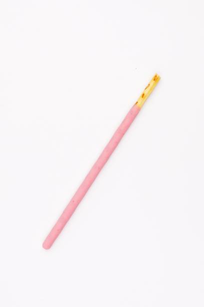istock Biscuit sticks coated with strawberry flavour confectionery 1068874532