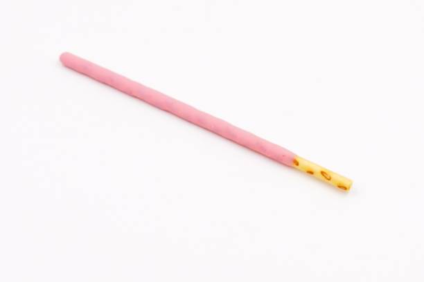 istock Biscuit sticks coated with strawberry flavour confectionery 1068878008