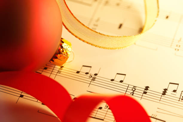 istock Christmas Ornament On Sheet Music 1068879550