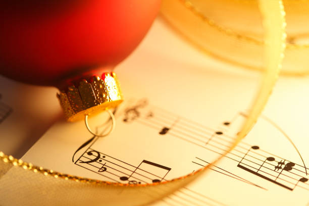 istock Christmas Ornament On Sheet Music 1068879562