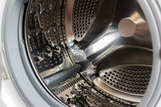 istock Close-up photo of empty washing machine tank. 1068888130
