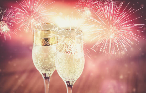 istock Winter background with New Year Champagne glasses 1068890444