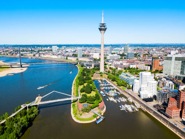 Medienhafen Media Harbour district, Dusseldorf Rheinturm and Media Harbour district in Dusseldorf city in Germany media harbor photos stock pictures, royalty-free photos & images