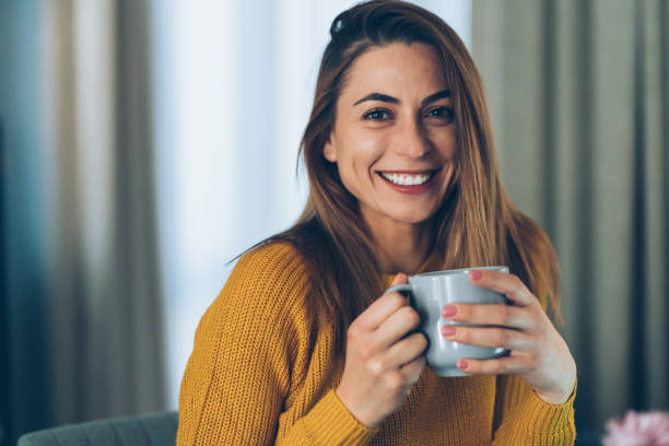 istock Woman with coffee 1068899470