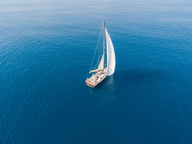 istock A lone sailing boat at anchor aerial view 1068901430