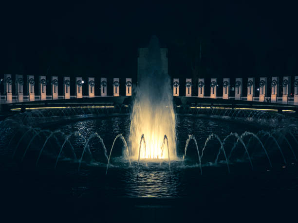 istock World War II memorial in Washington D.C. illuminated at night 1068901970