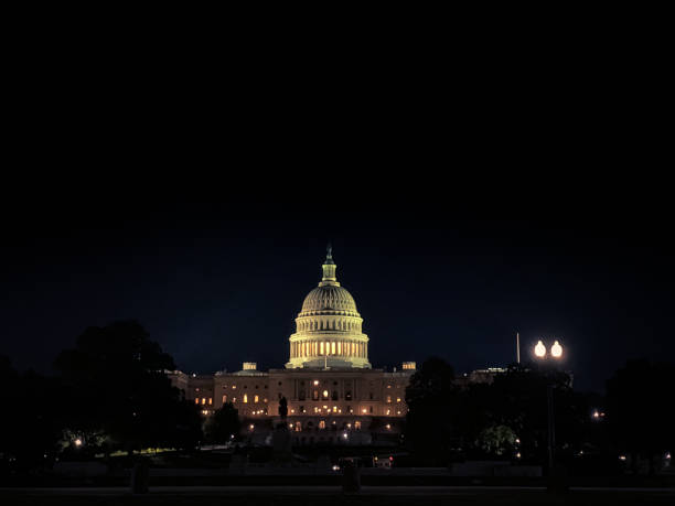Untied States Capitol at night in Washington D.C. stock photo