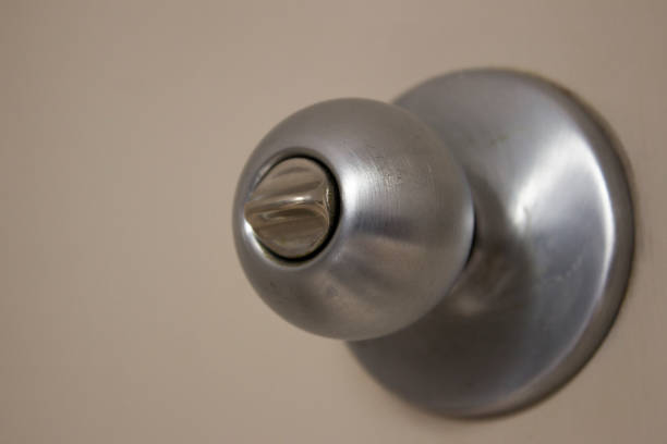 istock Close shot of a silver iron doorknob. 1068903346