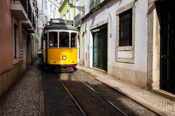 istock Traditional yellow tram at old streets 1068903444