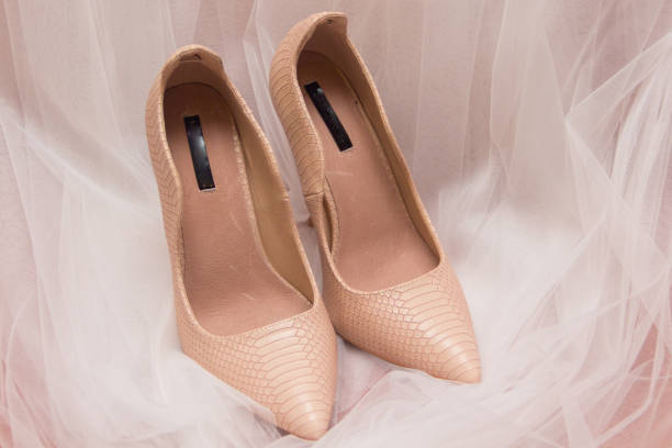 istock Wedding shoes and white wedding or bridal veil 1068903666