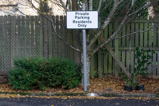 istock Private parking residents only sign 1068909896