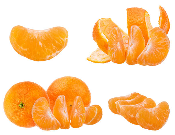 istock Peeled mandarin orange segments isolated on white background with clipping path 1068911402