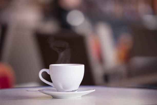 istock White cup of coffee on the cafe table 1068915694