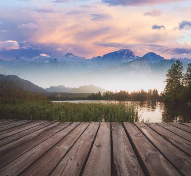 istock Alpine mountain lake sunny morning view 1068916446