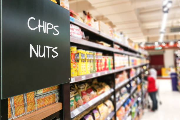 istock Chips and Nuts grocery category aisle at supermarket 1068925244