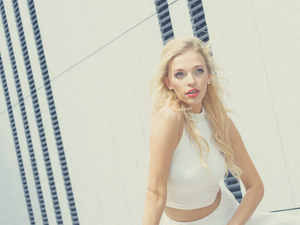 istock Blonde woman in city 1068931480