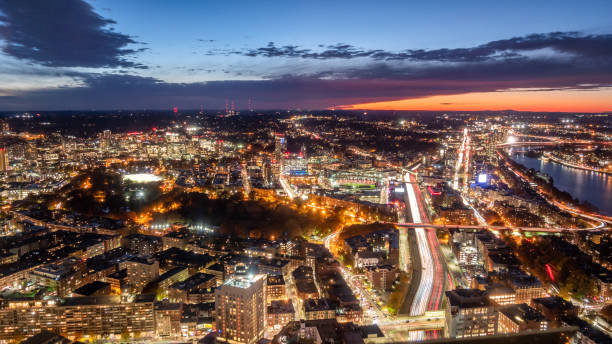 istock Panoramic View of West Boston Downtown Buildings At Night 1068935210