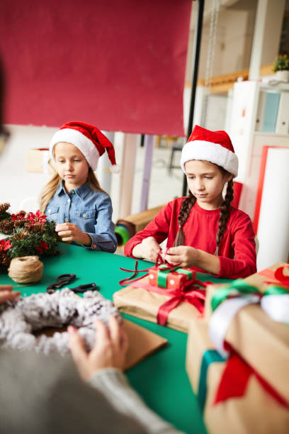 istock Girls preparing for Christmas 1068937306