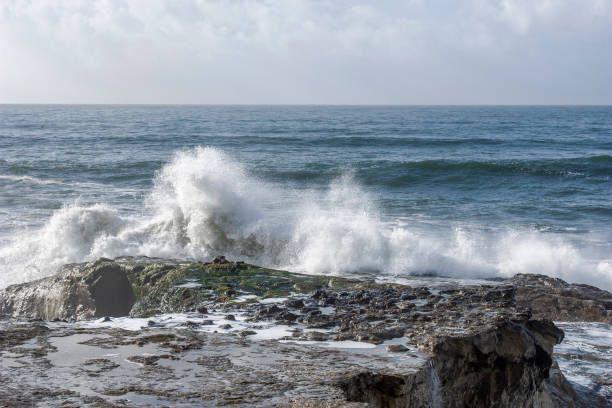 istock Large Turbulent Ocean Waves Off California Coast 1068954452