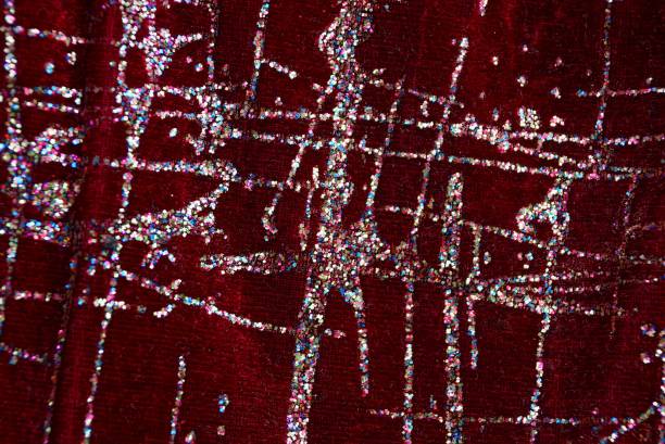 istock red velvet fabric texture on clothes with glitter 1068954592