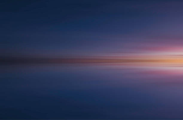 istock Reflection of colorful abstract sunset background - Stock image 1068955044