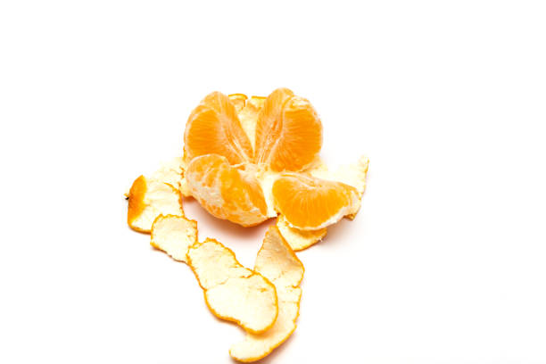 istock Fresh peeled mandarin orange isolated on white background 1068963142