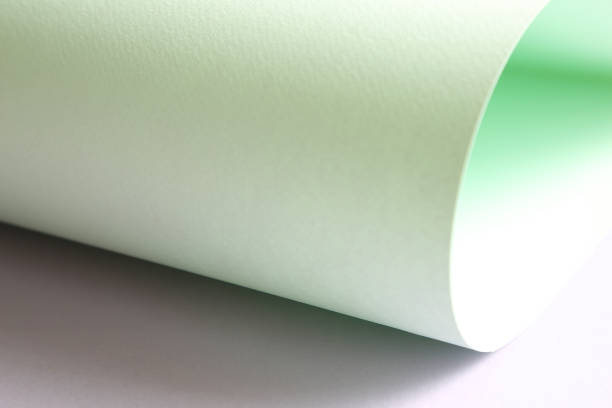 istock Mint and purple color abstract paper background 1068963266
