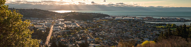 2018, September 29 - Nelson, New Zealand, View of Nelson Town at sunset. 2018, September 29 - Nelson, New Zealand, View of Nelson Town at sunset. nelson city new zealand stock pictures, royalty-free photos & images
