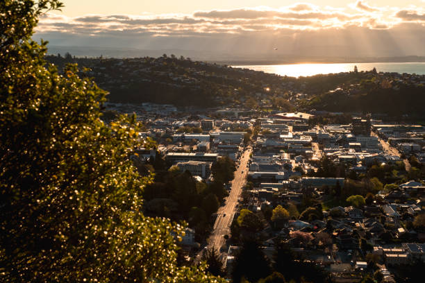 2018, September 29 - Nelson, New Zealand, View of Nelson Town at sunset. 2018, September 29 - Nelson, New Zealand, View of Nelson Town at sunset. nelson city new zealand stock pictures, royalty-free photos & images